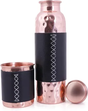 Artisan Copper 100% Pure Copper Bottle (32oz/950ml) & Tumbler with leather sleeves. Handcrafted, hammered finish, leak-proof, lab-tested, and Ayurvedic. Perfect for hydration, gifting, and daily use.