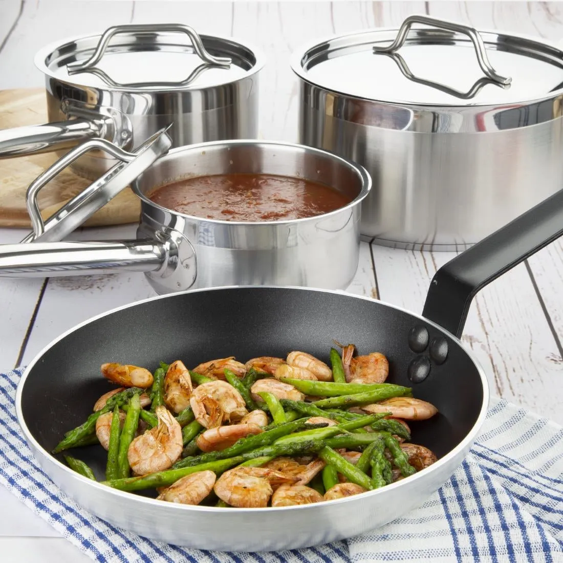 Nisbets Essentials Cook Like A Pro Stainless Steel & Aluminium 4-Piece Saucepan & Frying Pan Set